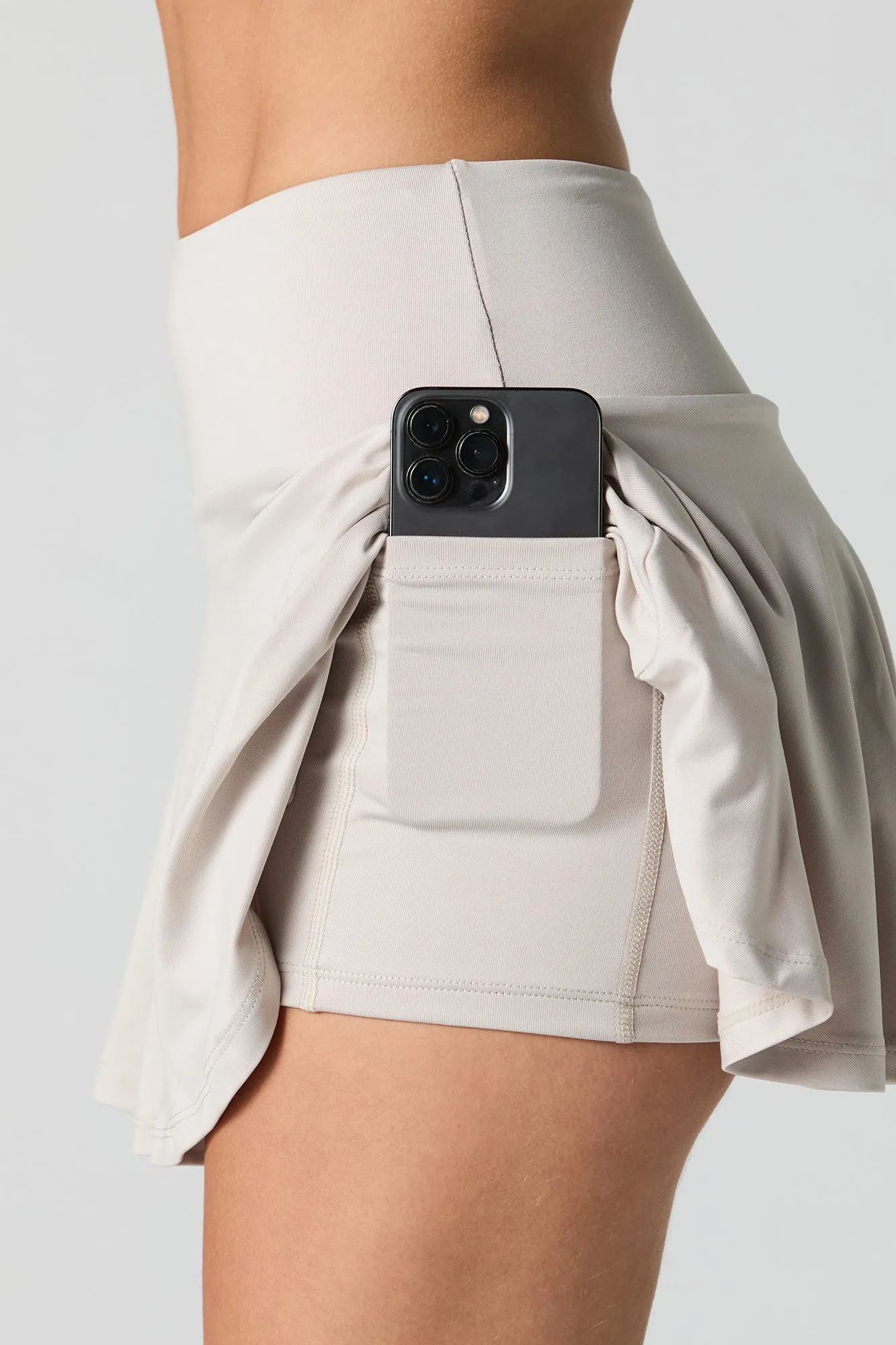 Jupe-short Active avec poche pour téléphone
