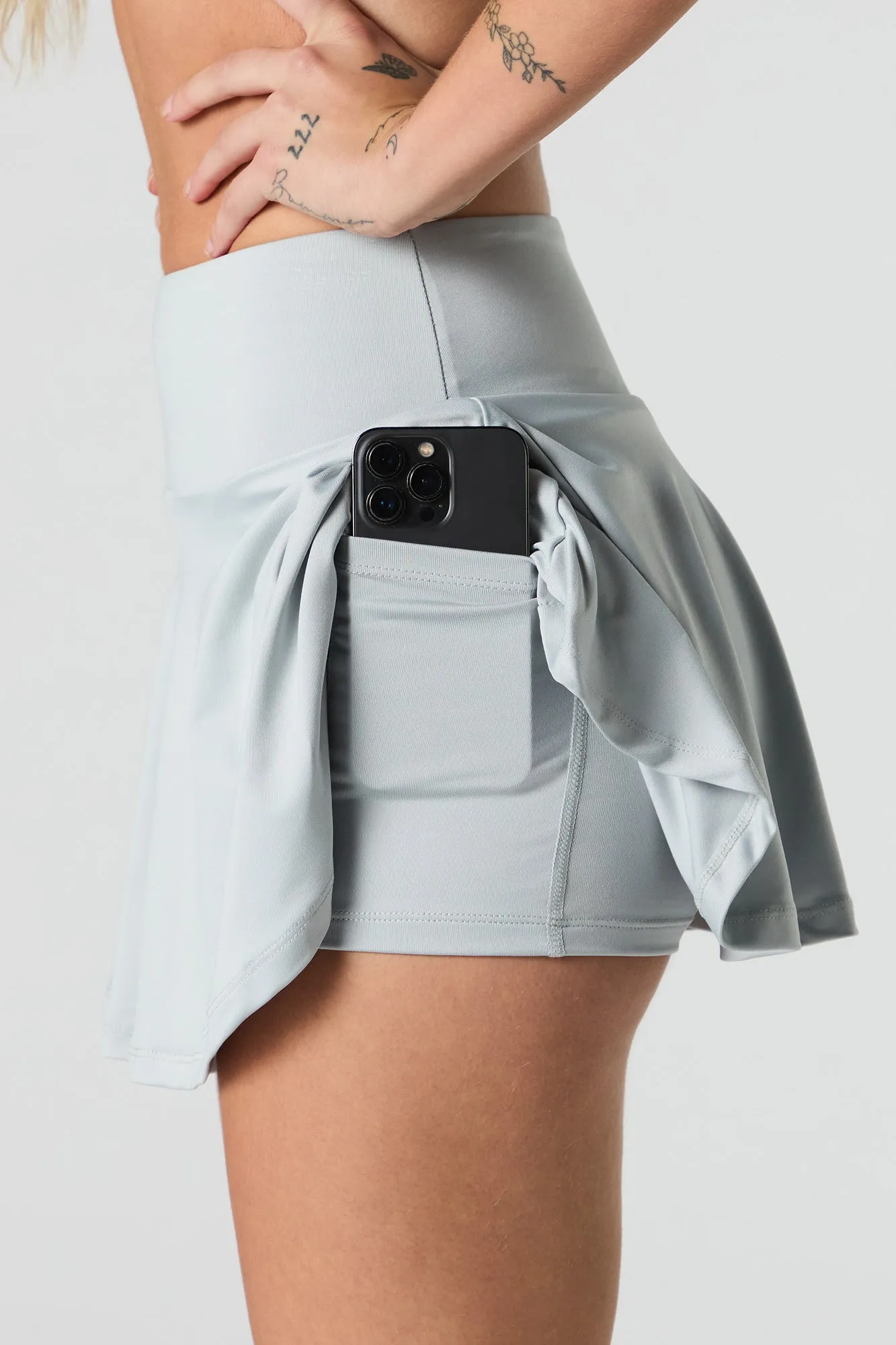 Jupe-short Active avec poche pour téléphone