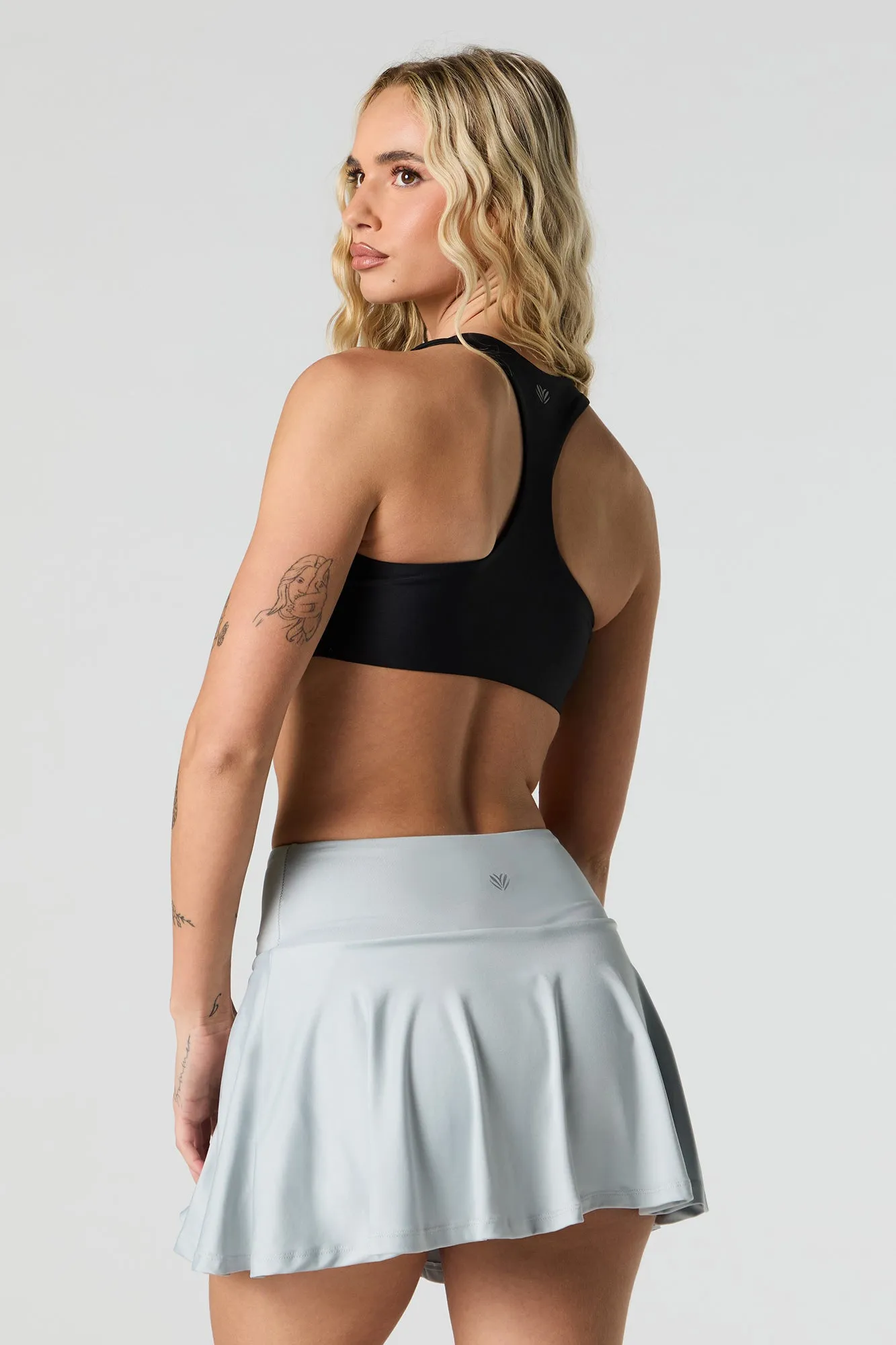 Jupe-short Active avec poche pour téléphone