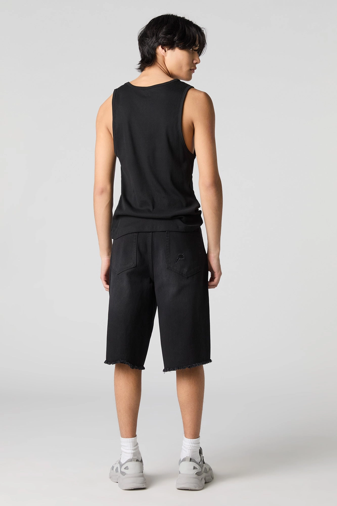 Short de planchiste en denim d'aspect usé délavé noir